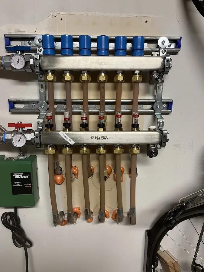 Plumber performing Gas Line Installation at a residential property in East Highland Park